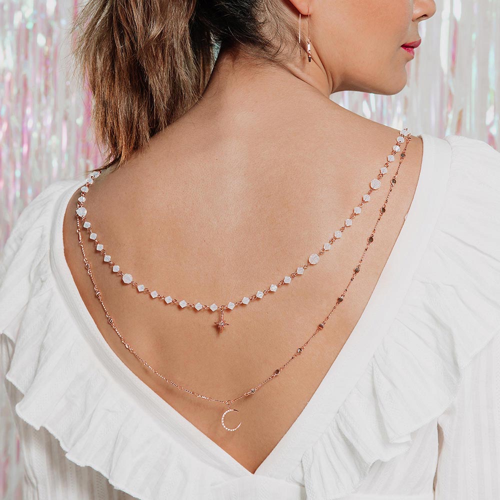 Callista moon star layered necklace with low back dress