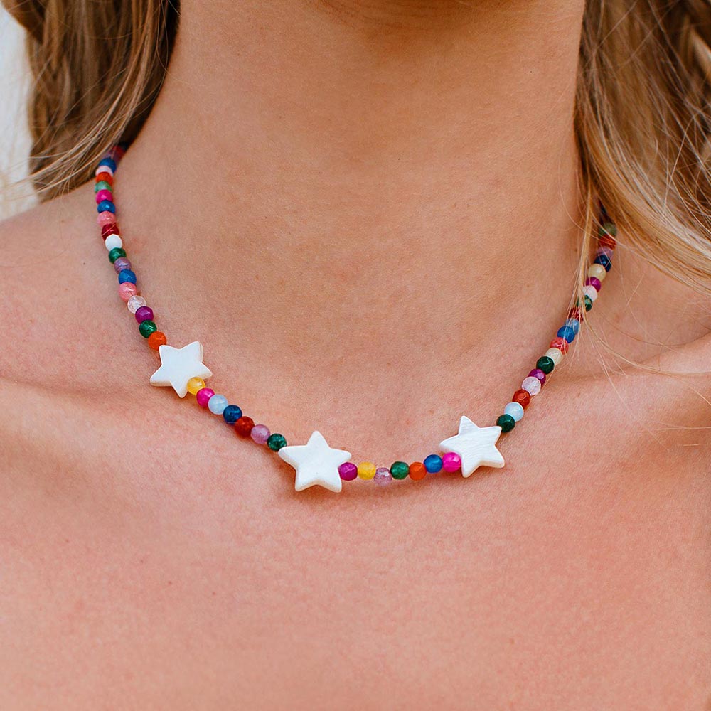 Stella dainty multicolour stone necklace with pearl stars close up of neck