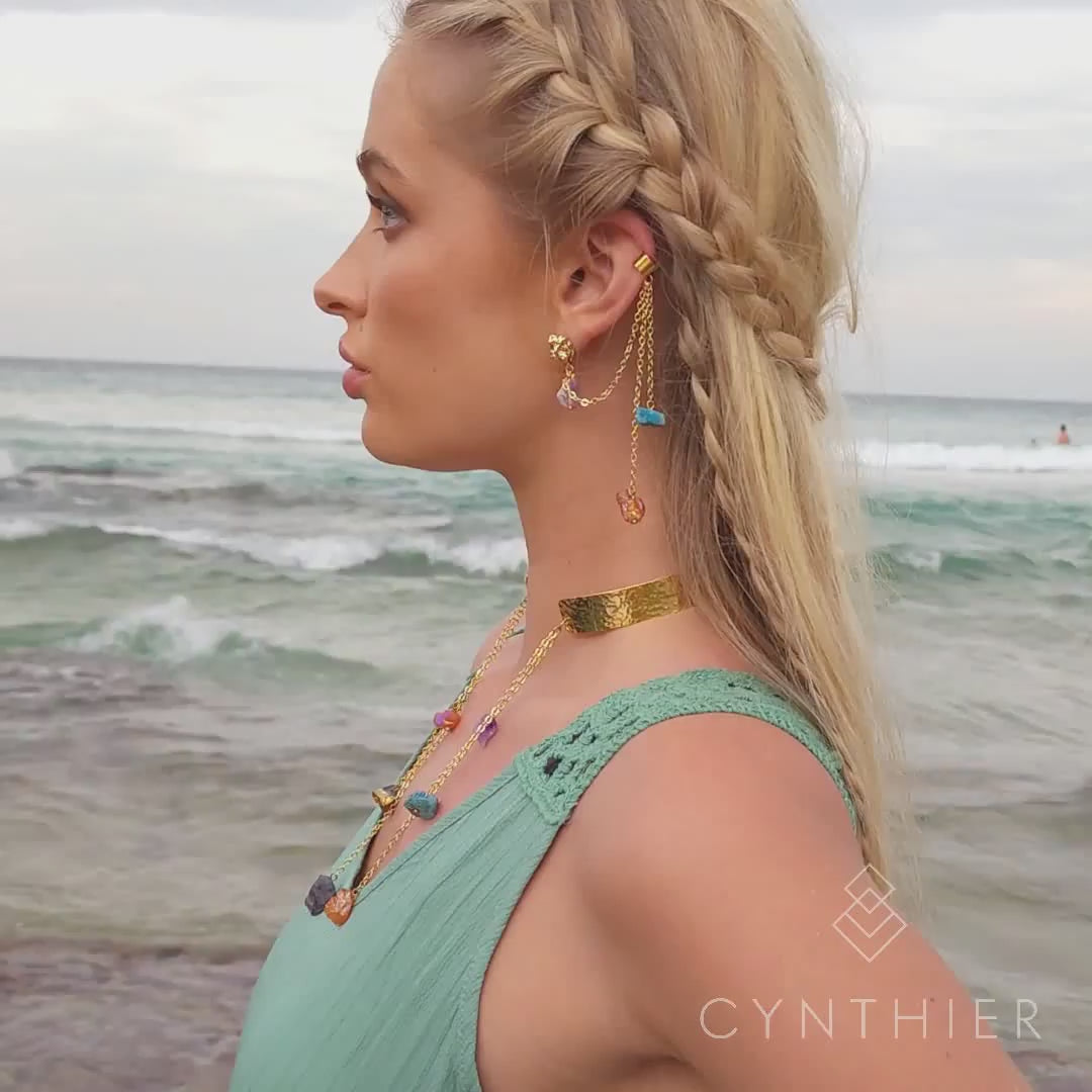 Raye necklace earrings video at beach